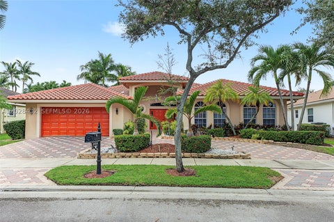 Photo of 3852 Oak Ridge Cir, Weston, FL 33331 (MLS # A12028432)