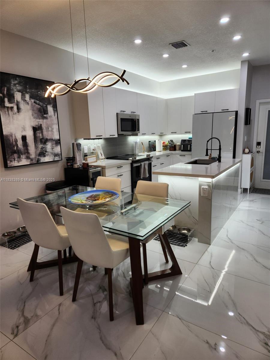 Ground apartment with patio-balcony. Interior design, custom closets. No sun exposure. Beautiful walking areas with children playground, nearby to Doral Parks. Quart countertop kitchen, stainless steel appliances. Porcelain throughout the floor and wood accent wall. Primary bathroom with two vanities. Shades and blackouts in all windows. Close to supermarkets, banks, restaurants, entertainment areas. Great access to highways 826, 836, and Turnpike. Minutes to Miami International Airport, shopping malls, medical facilities, golf courses in the heart of Doral.