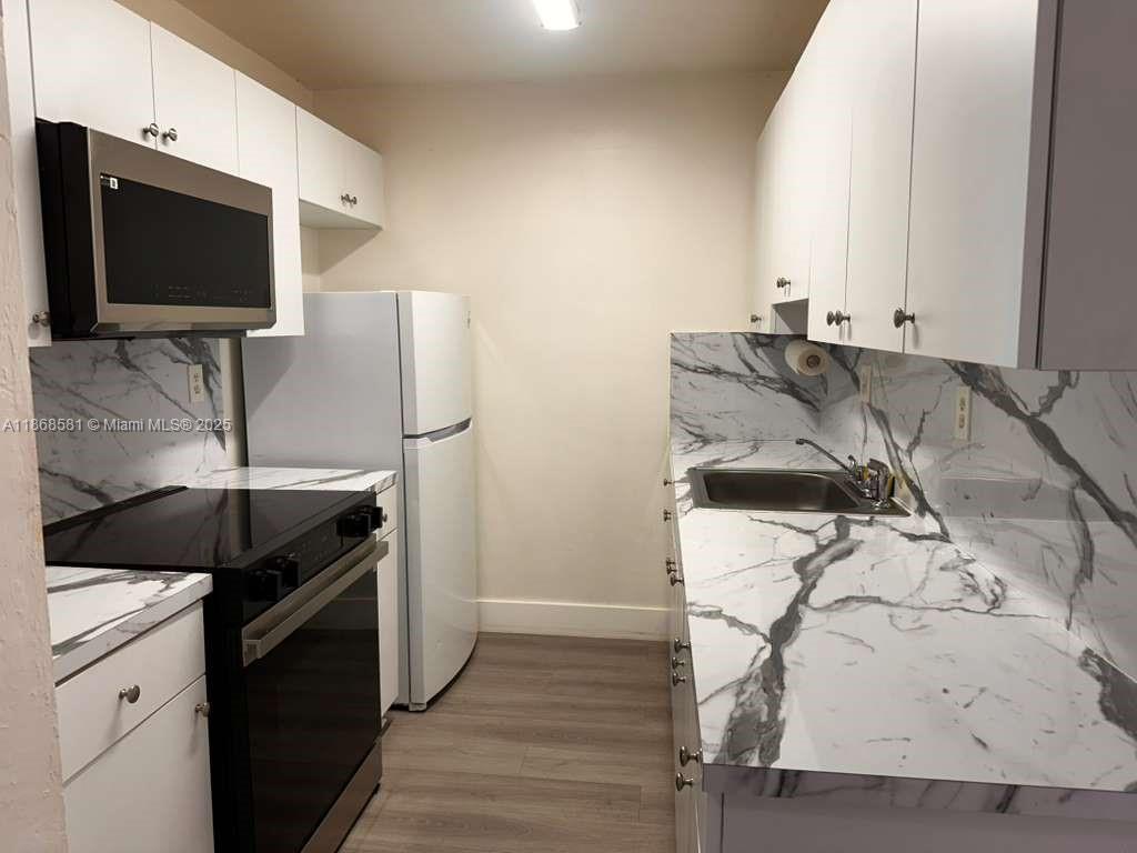 CYPRESS VILLAGE CONDO - Residential Lease