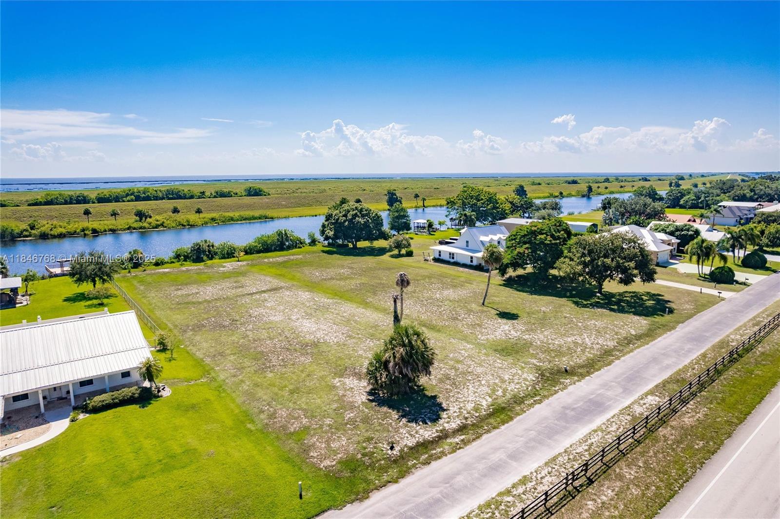 Welcome to Your Slice of Waterfront Paradise!
Tired of the daily grind and dreaming of a life surrounded by nature and possibility? Build your dream home on a stunning oversized, cleared lot where serenity meets adventure.
Catch dinner from your own backyard, pick ripe tropical fruit from trees you planted, watch stars sparkle across the clear night sky, & create your own vegetable garden
Directly accessible to the rim canal in your backyard just beyond Lake Okeechobee, offering endless world class fishing & boating adventures.You can build your own private dock and boat ramp or take advantage of the community’s private boat launch.
Convenient access to Highway 441, while enjoying the calm of this peaceful, close-knit community.
Don’t just buy land—create your dream lifestyle.