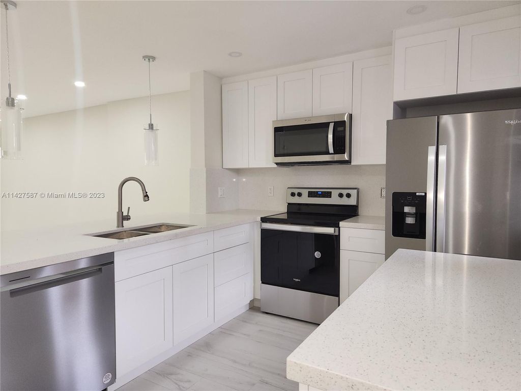 Photo of 610 NE 12th Ave #203, Hallandale Beach, FL 33009 (MLS # A11427587)