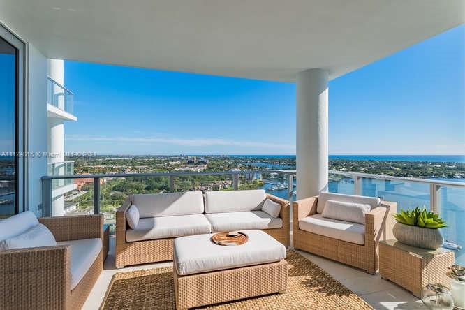 Fabulous turnkey penthouse residence in exclusive Water Club North. Breathtaking wide Intracoastal & Atlantic ocean views the minute you walk in the door. Access controlled elevator to your home in the sky. This is a pass through unit w/Intracoastal, ocean and city views. Ideal PH floor plan featuring floor to ceiling glass, direct east ocean views, 3bed, 3 bath plus den and powder room. No expense spared! Interior designer selected interior finishes & furnishings including lighting fixtures, stunning polymer ceiling treatment, custom closet cabinetry, Hunter Douglas motorized shades and elegant wall coverings. Secondary entrance for guest suite & den. 3 parking spaces.