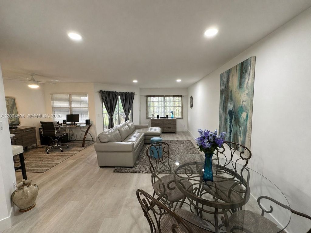 Photo of 12650 SW 6th St #412K, Pembroke Pines, FL 33027 (MLS # A12004596)