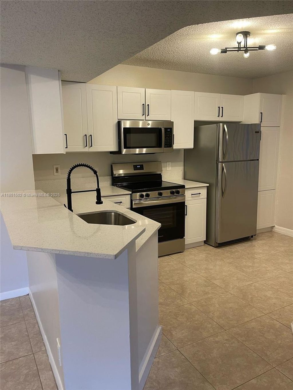 Photo of 8781 Wiles Rd #101, Coral Springs, FL 33067 (MLS # A11801502)