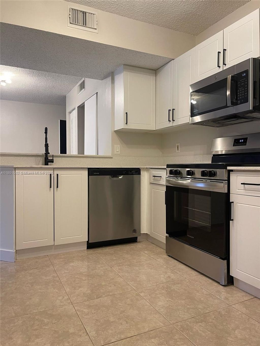 Photo of 8781 Wiles Rd #101, Coral Springs, FL 33067 (MLS # A11801502)