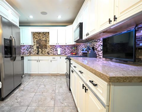 Tiny photo for 7105 SW 3rd Ct, North Lauderdale, FL 33068 (MLS # A11956471)