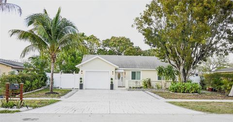 Photo of 7105 SW 3rd Ct, North Lauderdale, FL 33068 (MLS # A11956471)