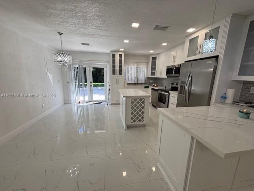 Spacious remodeled 3/2 very clean and cozy home, 1 car garage and 2 parking's in front of the property, nice patio with partial lake view, ready to move in, washer and dryer. Ready to move in, quiet neighborhood and near great schools and walking distance to shopping centers.  Easy to show Supra Lockbox