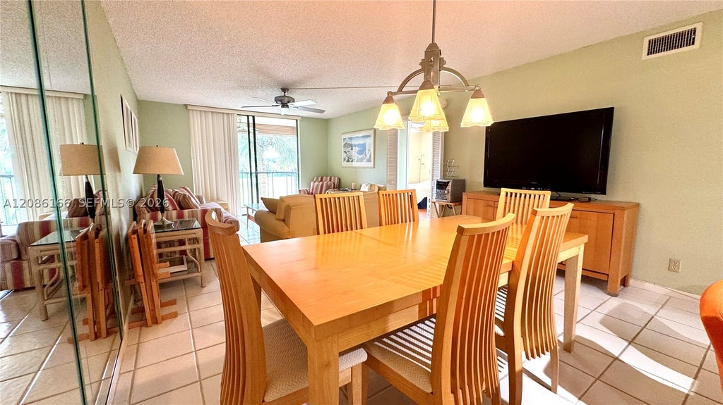 Photo of 2420 S Deer Creek Country Club Blvd #207-D, Deerfield Beach, FL 33442 (MLS # A12086166)