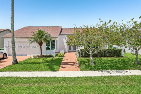 Photo of 16791 Royal Poinciana Dr, Weston, FL 33326 (MLS # A12063475)