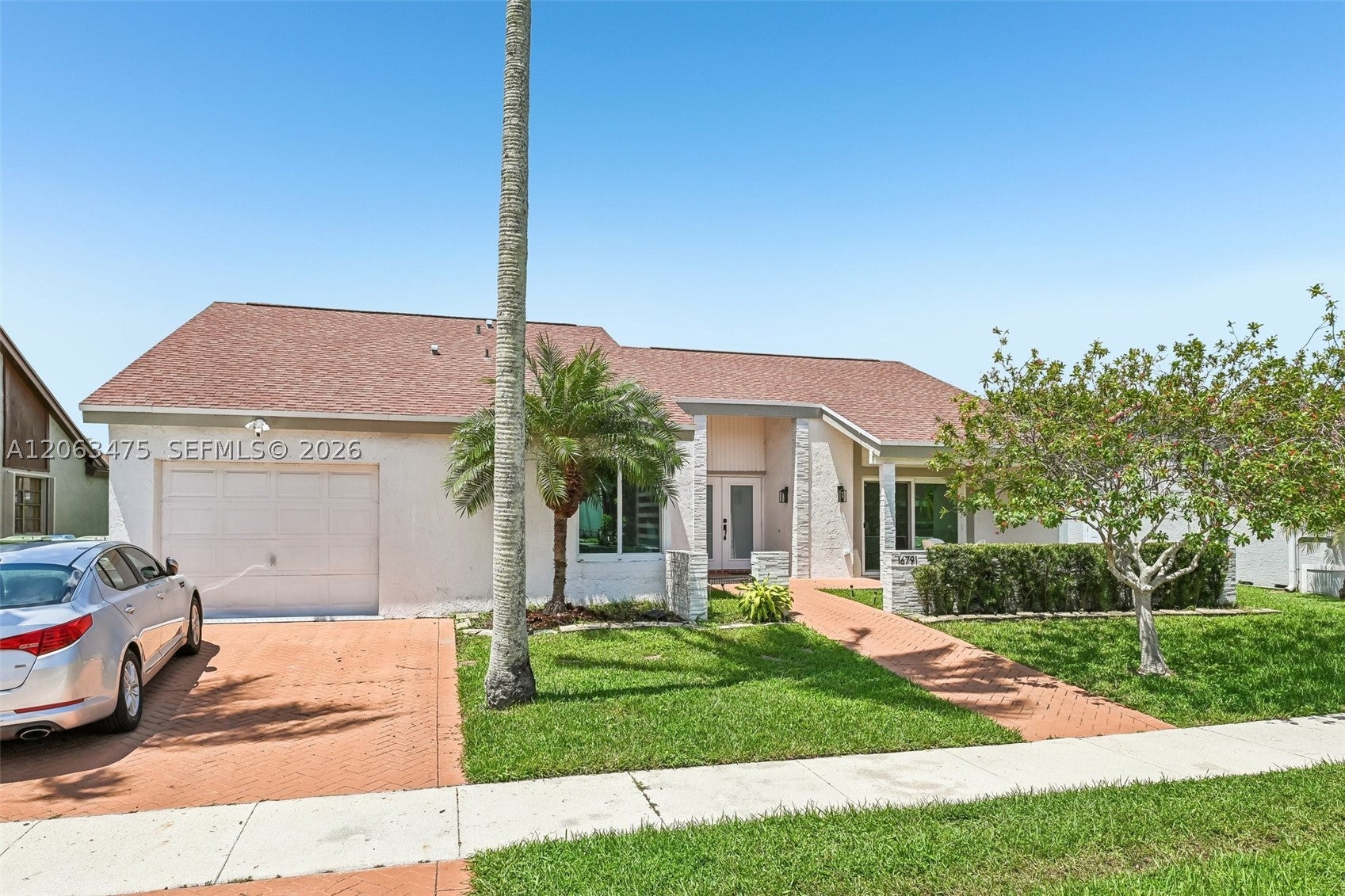 16791 Royal Poinciana Dr, Weston FL 33326