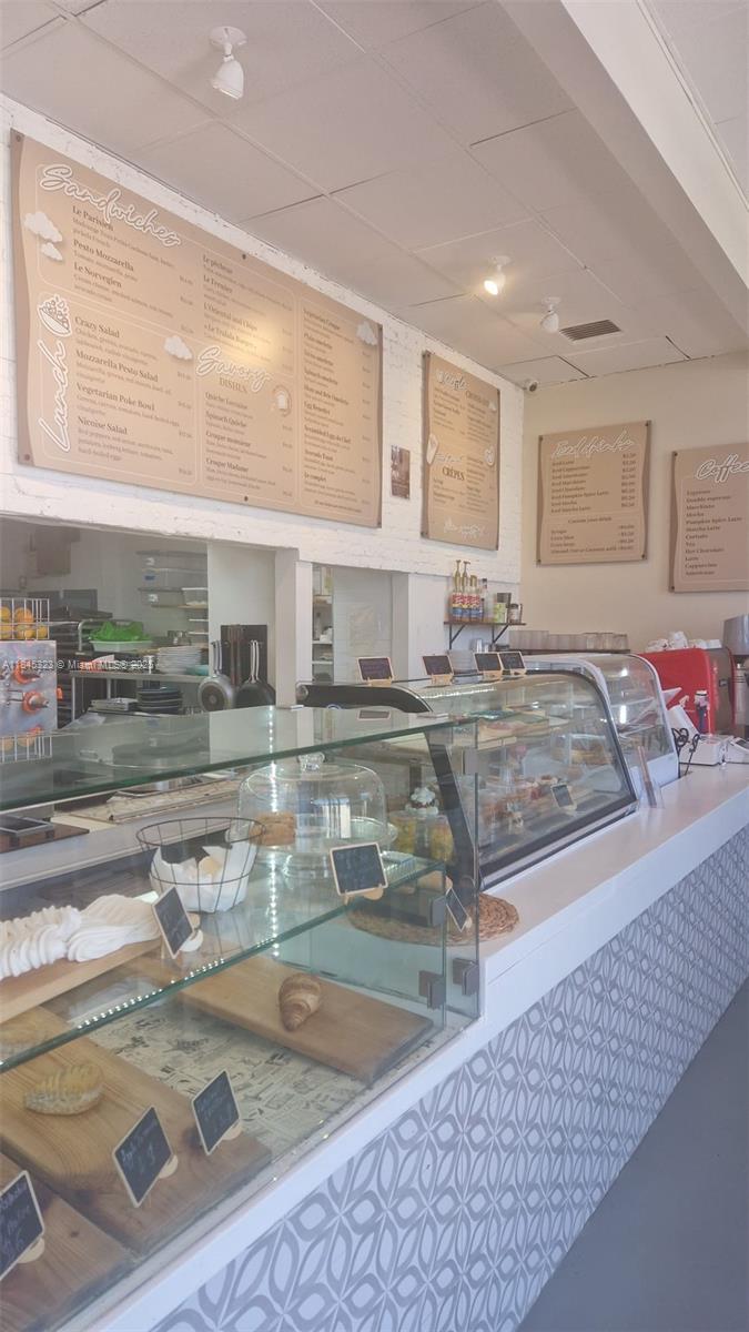 Assets sale. Turn key second gen bakery café with all licenses/permits in place and a grease trap recently recertified. 1400 sq/ft. long lease in place until 2034 with a reasonable rent of $10,351 that includes waste mgmt. Full kitchen with walk in cooler and walk in freezer. No hood but can be added easily. Perfect space for a bakery or QSR concept. Easy to show. Call Listing agent.
