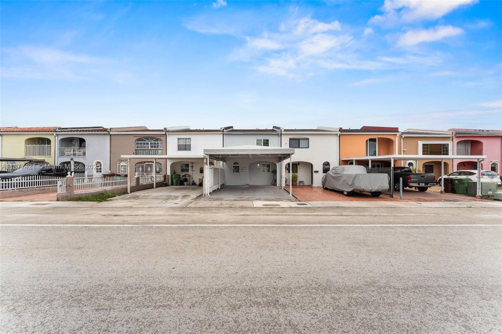 Beautifully maintained 2-story townhouse with direct lake views and NO HOA! This 2 bed, 1.5 bath home features a spacious layout, updated kitchen with granite counters, and tile & wood flooring throughout. Enjoy peaceful mornings on your private balcony overlooking the lake or entertain on the covered patio with extra storage. Impact windows & doors, central A/C, and 2 dedicated parking spaces add value and convenience. Ideally located near Miami Lakes, Palmetto Hospital, shopping, dining, and major highways. Lakefront homes here rarely last—SHOWINGS BEGIN DURING OPEN HOUSE SUNDAY September 28 1-3PM.