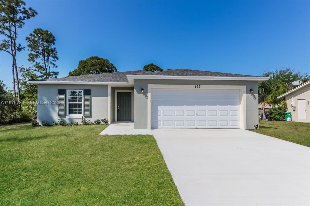 Photo of 957 SE Caravan Ave, Port St Lucie, FL 34983 (MLS # A11976783)