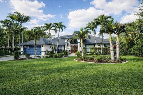 Photo of 12119 Orange Blvd, West Palm Beach, FL 33412 (MLS # A12016969)