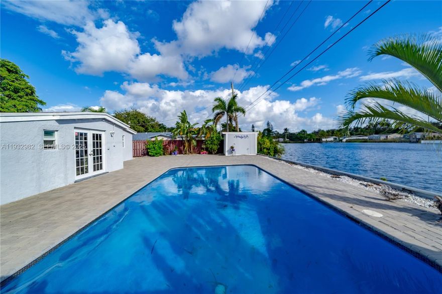 LIVE LIKE YOUR ON VACATION ALL YEAR AROUND. COMPLETELY UPDATED HOUSE WITH MULTI-MILLION DOLLAR VIEWS !! THIS IS ONE OF THE BEST PRICED POOL HOMES ON WATER IN SOUTH FLORIDA. EXCELLENT LOCATION CENTRAL TO EVERYTHING. IN BETWEEN FT. LAUDERDALE, SOUTH BEACH,AND DOWNTOWN MIAMI. ONLY FEW MILES FROM THE BEACH THIS ONE IS A REAL WINNER. ALL IMPACT WINDOWS, NEWER ROOF, ALL UNDERGROUND PLUMBING CHANGED TO PVC. EASY TO VIEW AND QUICK APPROVAL PROCESS.