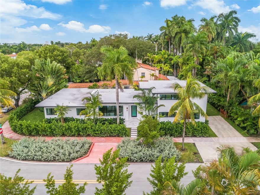 This stunningly renovated home will immediately demand your attention as you step through the door, with its large open living spaces and high end finishes. This light filled 5 bed, 3.5 bath is perfectly situated on a corner lot in Miami's prestigious Mid-Beach neighborhood. The second floor of this two story home is completely designated to the primary suite featuring a large marble bathroom and beautiful walk in closet. The entire property is fully landscaped with lush landscaping and beautiful outdoor lighting for nighttime entertaining. Just a quick stroll down the street you will find a path leading to some of Miami's best downtown views and stunning sunsets. Pool is still awaiting finalized permit. As per permitted plans measurements of the home are 3,033 SF