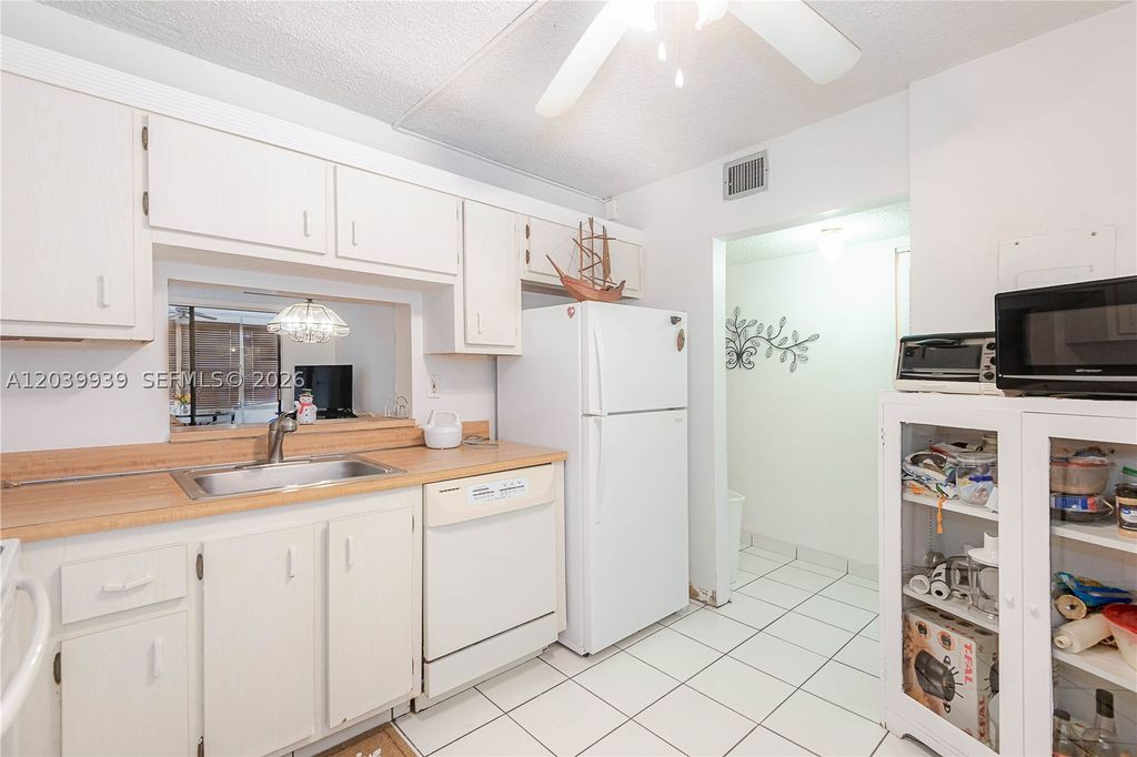 Photo of 2800 Somerset Dr #115J, Lauderdale Lakes, FL 33311 (MLS # A12039939)