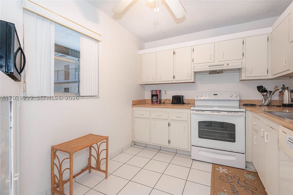 Photo of 2800 Somerset Dr #115J, Lauderdale Lakes, FL 33311 (MLS # A12039939)