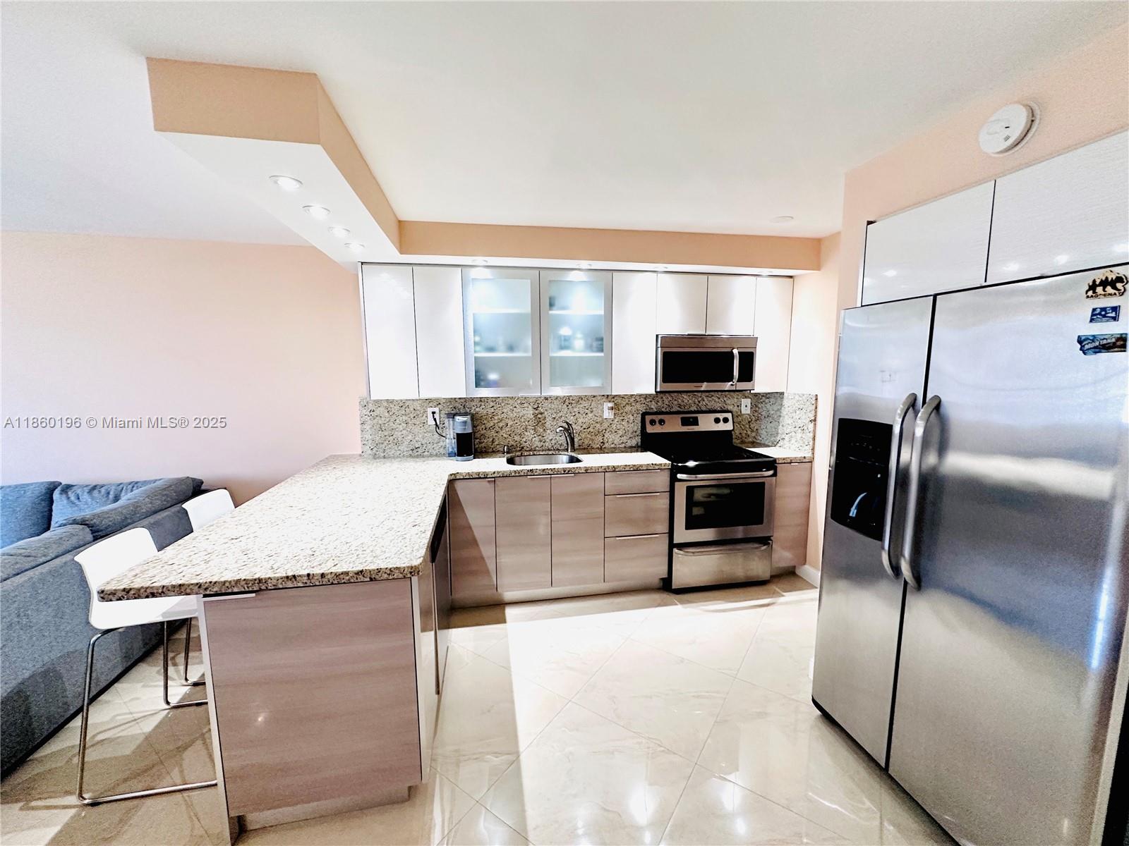 Experience this luxury of prestigious Sunny Isles Beach without the high rent in this spacious 595 SqFt tastefully renovated studio. Enjoy a full size murphy bed and convertible sofa in the living room. Enjoy paradise just steps from the beach, supermarkets, parks, shops, restaurants, and more. Amenities include a solar deck, pool (under renovation), gym, sauna, concierge, valet service, and 24/7 security. Top-rated A and B+ public schools. The free community shuttle stops right at your door. Live your dream just a 5-minute walk from the Atlantic Ocean. Call now to claim your slice of coastal bliss!