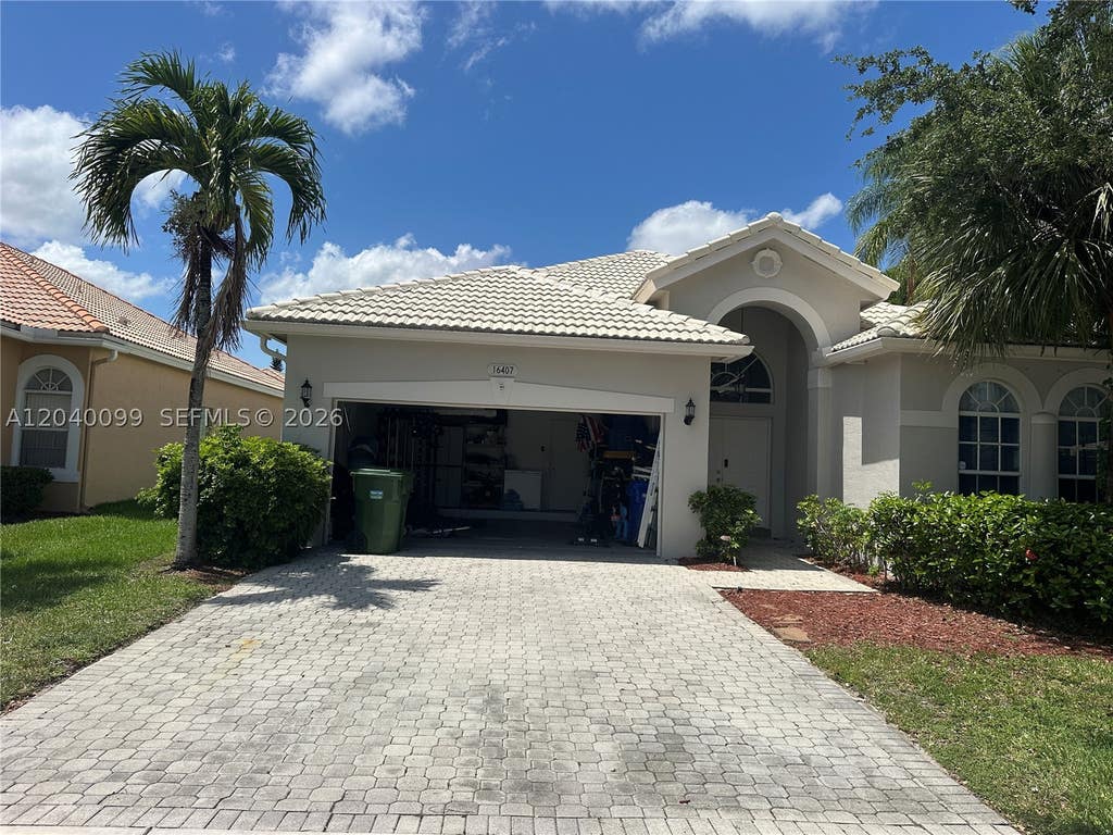 Photo of 16407 SW 1st Ct, Pembroke Pines, FL 33027 (MLS # A12040099)