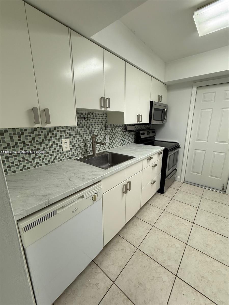 Rental Property at 9971 W Bay Harbor Dr 205, Bay Harbor Islands, Miami-Dade County, Florida - Bedrooms: 1 
Bathrooms: 2  - $2,000 MO.