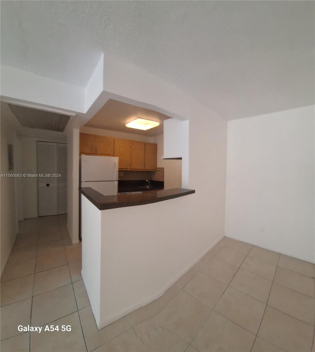 Photo of 5849 Washington St #77, Hollywood, FL 33023 (MLS # A11560063)