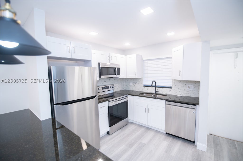Photo of 2755 W Atlantic Ave #D206, Delray Beach, FL 33445 (MLS # A12095735)