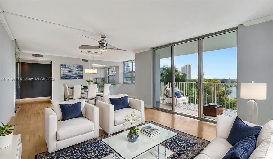 Discover this spacious corner two-bedroom, two-bath apartment boasting stunning waterfront views and an abundance of natural light.  As the largest bedroom-to-bath model in the building, this residence offers wood floors throughout the main living area, a sleek modern kitchen, brand-new carpet in both bedrooms, and fresh paint for move-in ready feel.  Enjoy a prime location near vibrant shops, dining, and entertainment, plus access to a variety of desirable amenities.  This property is currently leased until August 2026.