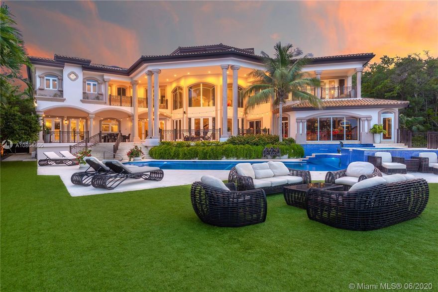 Nestled in exclusive, 24 hr guard gated Tahiti Beach Island, this private estate offers a 49,045 SF lot and 119ft water frontage w direct ocean access and private dock. This elegant property features a grand entryway greeted by double height ceilings in the formal living and dining areas, fireplace, media and recreation rooms w bar, expansive chef’s kitchen, all surrounded by large terraces overlooking the pool and bay. Large master suite offers a spacious bath, sauna and walk in closets, sitting area and balcony to enjoy the city and bay views. Extras include elevator, gym, office, 3 car garage w lift to accommodate 3 additional cars, porte-cochere for additional covered parking and private entry to service quarters. Community amenities include private beach, tennis and basketball courts.