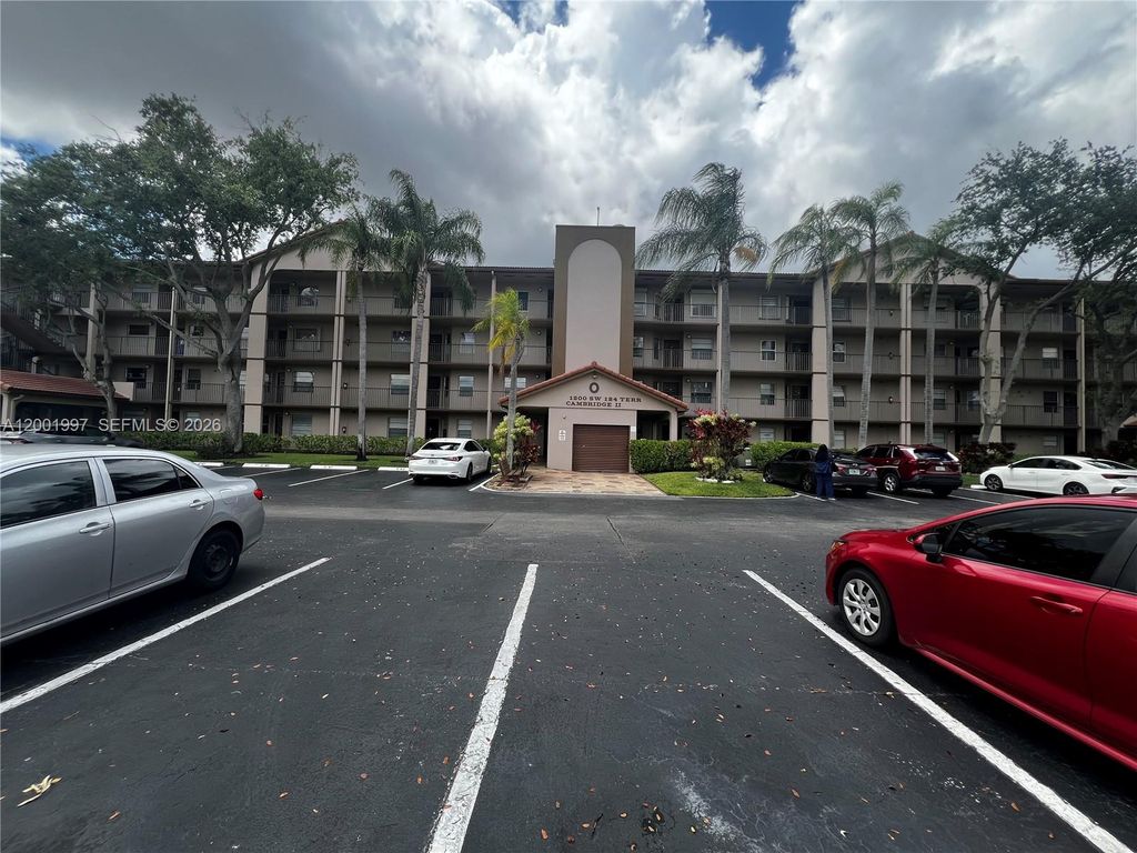 Photo of 1200 SW 124th Ter #106O, Pembroke Pines, FL 33027 (MLS # A12001997)