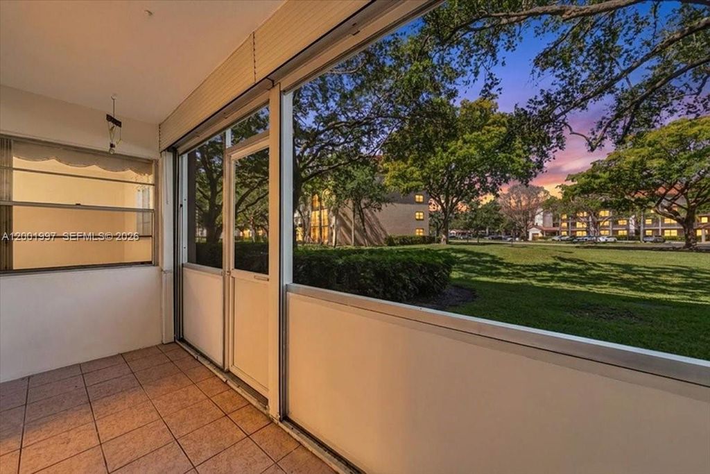 Photo of 1200 SW 124th Ter #106O, Pembroke Pines, FL 33027 (MLS # A12001997)