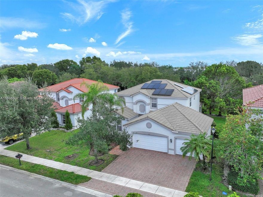 Live in the sought-after gated community of Sunset Falls in Miramar! This spacious 5-bedroom, 3-bath home offers a large living room, formal dining, and family room ideal for entertaining. The well-equipped kitchen features ample cabinetry and stainless steel appliances. One bedroom and full bath are conveniently located on the first floor. The primary suite includes dual sinks, a separate tub and shower, and walk-in closets. Enjoy tile and carpet flooring, a 3-car garage, and a private backyard with garden views. Community amenities include a clubhouse, resort-style pool, fitness center, tennis courts, and 24-hour security. Close to top schools, shopping, dining, and major highways.