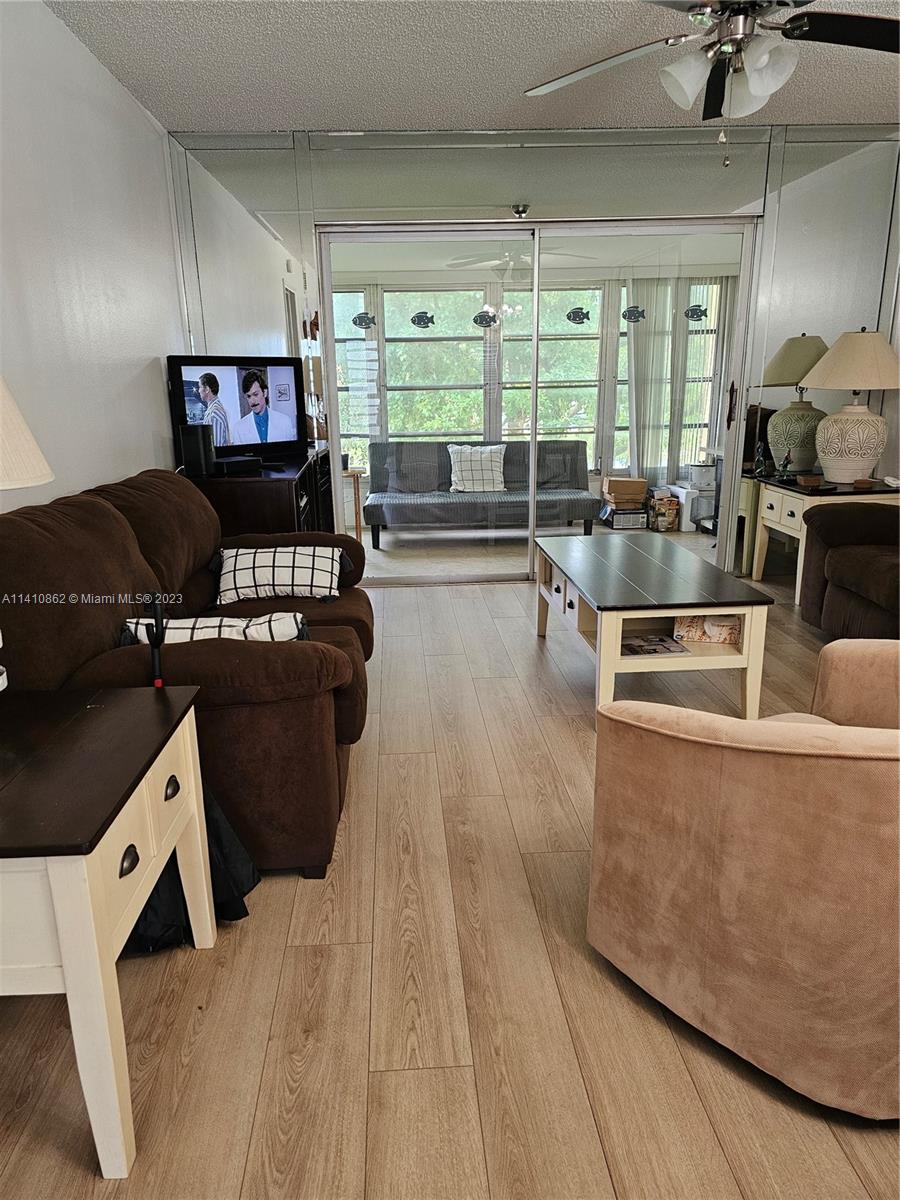 Cozy 1/1 Furnished unit located on the 3rd floor with an enclosed porch and shaded water views. It's close to the laundry room. The community has 4 swimming pools, clubhouse, fitness center, tennis courts, and lots of other amenities HOPA 55+. Close to restaurants, shopping, parks, & highways...The association requires $25K verifiable income and Good Credit Score. Equal Housing Opportunity.