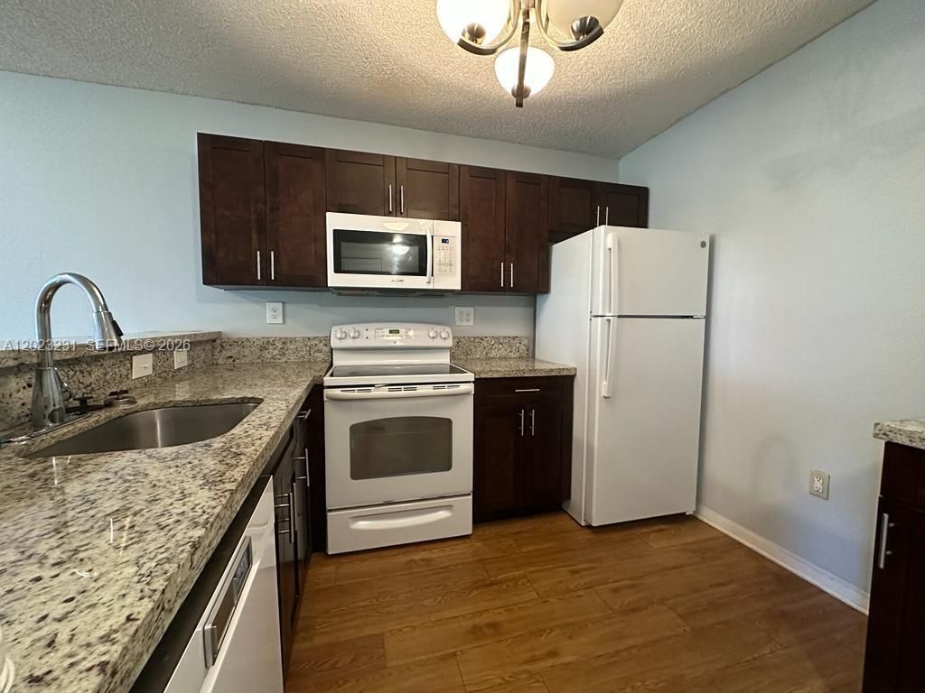 Photo of 9934 Nob Hill Pl #9934, Sunrise, FL 33351 (MLS # A12023231)