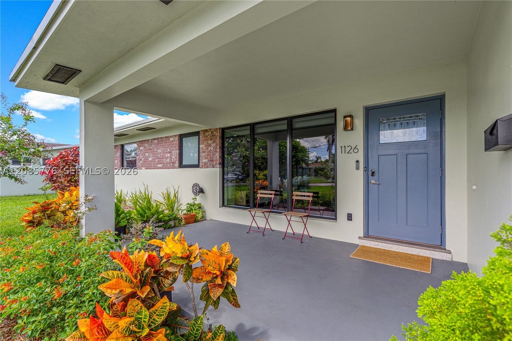 Photo of 1126 E Hawthorne Cir, Hollywood, FL 33021 (MLS # A12085776)