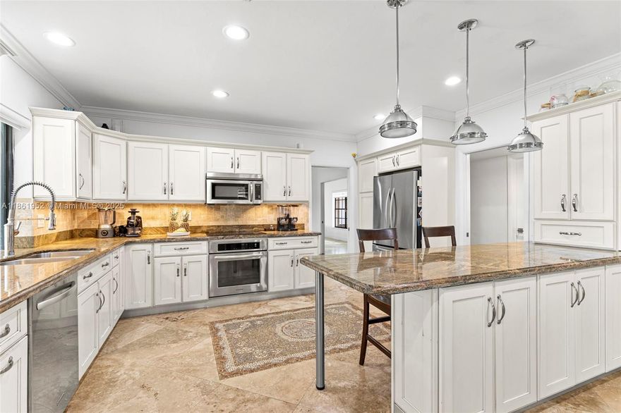 MUST SEE! Custom-built 4 bedroom, 4.5 bath home in the exclusive Country Club of Miami Estates. Offering over 3,300 sq. ft. of living space, this residence features elegant travertine flooring throughout. The remodeled open kitchen boasts granite countertops and stainless-steel appliances, flowing into a spacious family room and formal dining area. With two primary suites, it’s ideal for a large family or in-laws. Relax on your private covered lanai and enjoy tranquil golf course views, and there is plenty of room for a pool. Located in a secure community with 24-hour guard gate and roving patrol, and just minutes from the Palmetto Expressway, I-75, and the Turnpike. Make this your dream home today!