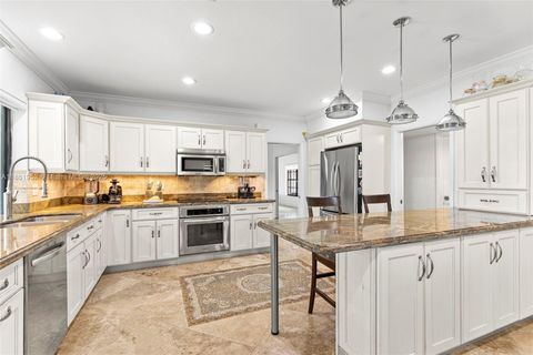 Photo of 19265 E Saint Andrews Dr, Hialeah, FL 33015 (MLS # A11861952)