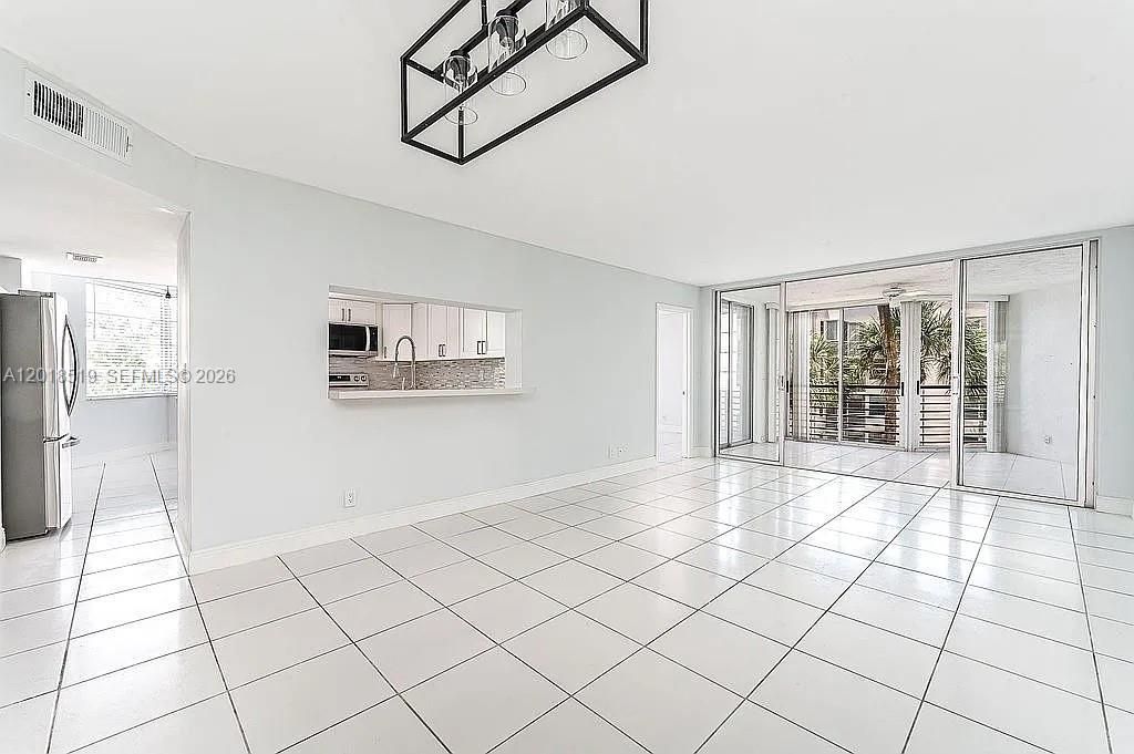 Photo of 1931 Sabal Palm Dr #301, Davie, FL 33324 (MLS # A12018519)