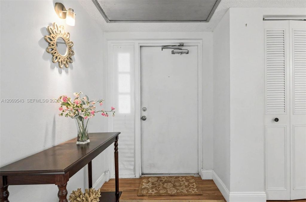 Photo of 9340 Lagoon Pl #110, Davie, FL 33324 (MLS # A12009543)