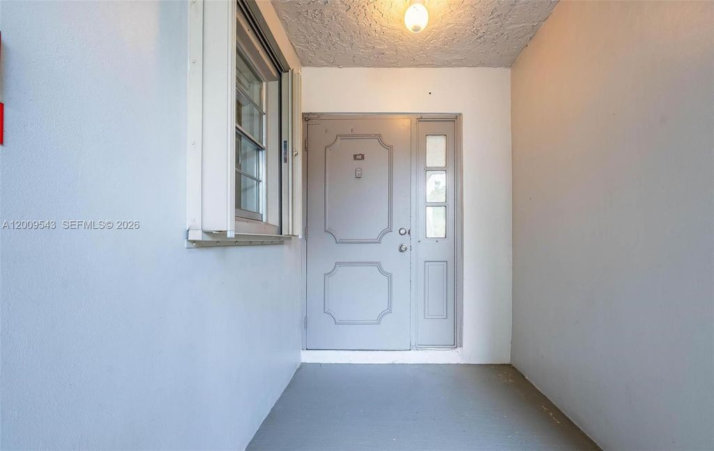 Photo of 9340 Lagoon Pl #110, Davie, FL 33324 (MLS # A12009543)