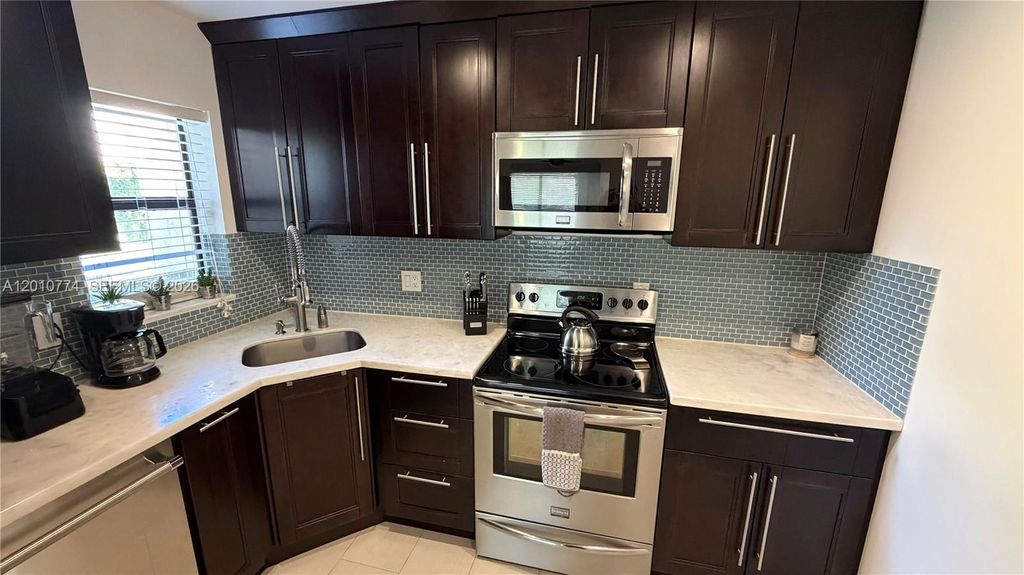 Photo of 2649 N Carambola Cir N #1735, Coconut Creek, FL 33066 (MLS # A12010774)