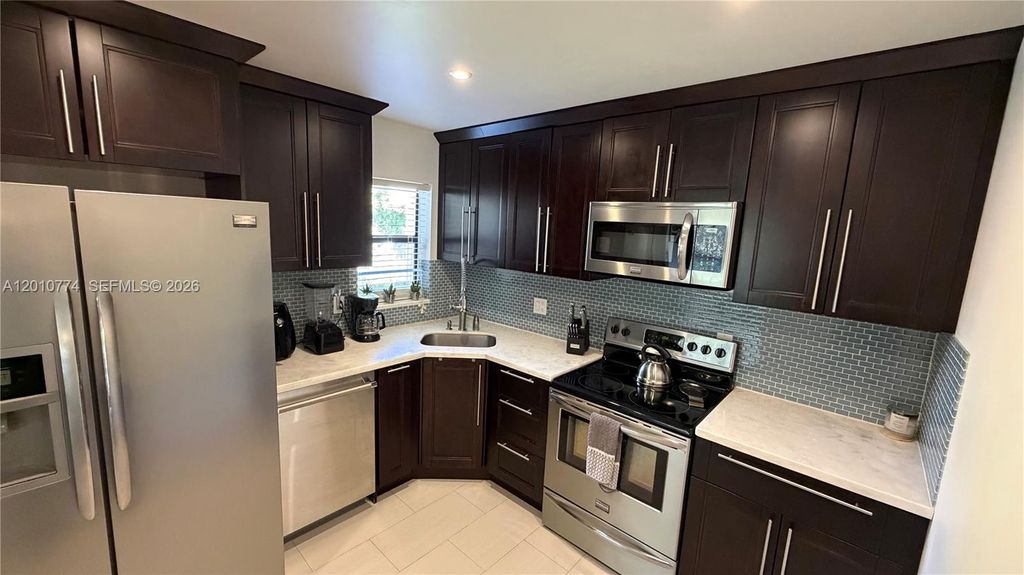 Photo of 2649 N Carambola Cir N #1735, Coconut Creek, FL 33066 (MLS # A12010774)