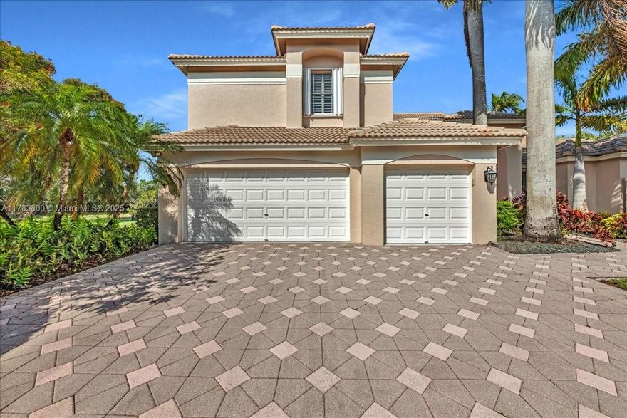 Discover ultimate privacy on a massive 18,314 SqFt lakefront cul-de-sac lot in Weston's premier 24-hour guard-gated community. This 4-bed, 3-bath + office home offers soaring ceilings, plantation shutters, and a bright, open great room. Enjoy a gourmet kitchen with granite countertops and stainless steel appliances, plus formal living, dining, and a spacious family room. The primary suite features a walk-in closet and a spa-inspired bath with Jerusalem tile, dual sinks, Jacuzzi tub, and walk-in shower. Outdoors, unwind in your tropical retreat with lush landscaping, a sparkling Diamond Brite pool, and a large fenced yard with tranquil lake views. Additional highlights include a 3-car garage and hurricane shutters. Zoned for top-rated Weston schools. Can be rented furnished or unfurnished
