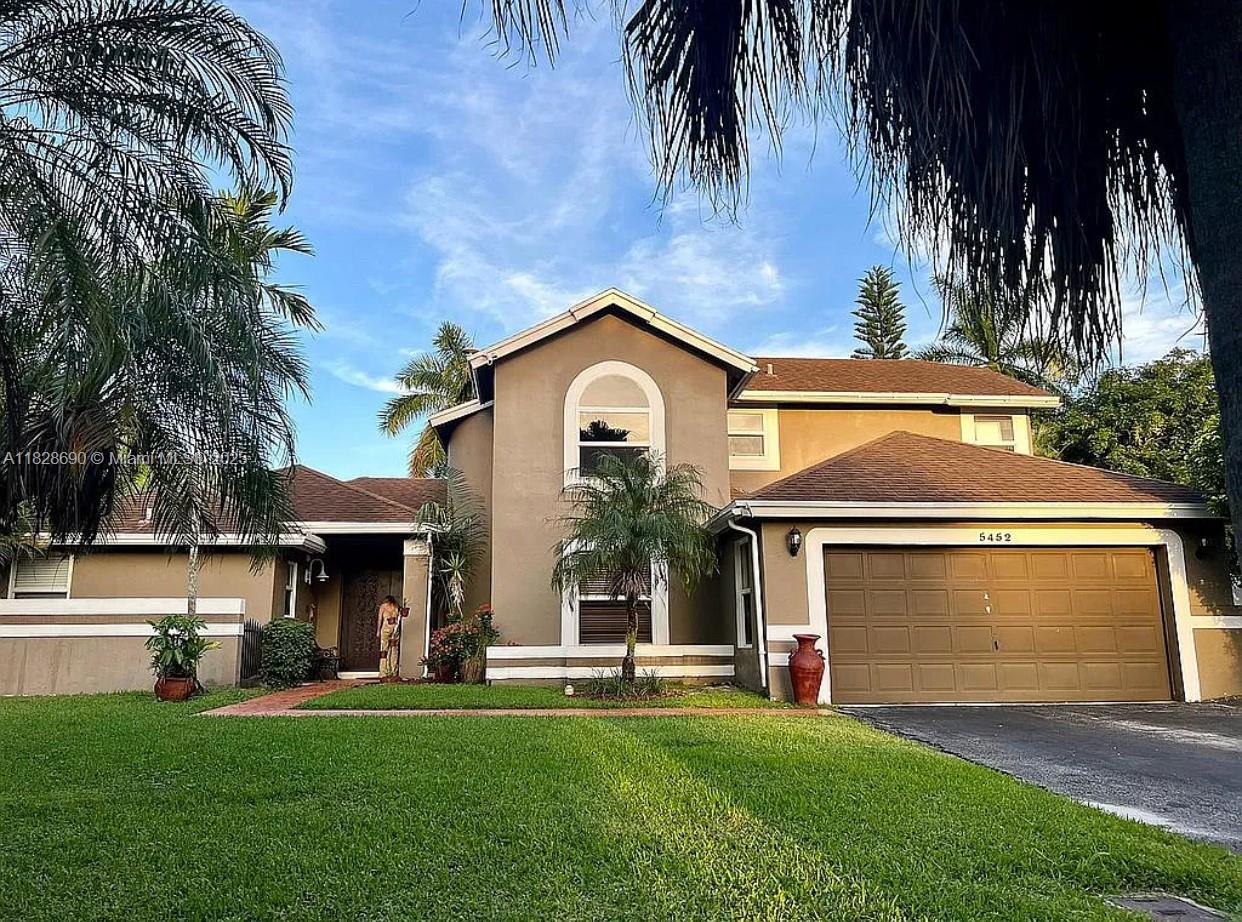 This stunning residence, built on a HUGE CORNER LOT , is situated in the highly sought-after Country Address community in Cooper City, known for being zoned for A-rated schools.
Spanning 2 floors, this house is a 4/3.5 PLUS a converted garage, providing ample space for comfortable living. Master bedroom and bathroom have been beautifully renovated.
Impact windows and doors throughout the house.
The big corner lot occupying nearly 1/2 acre,yard is both tiled and untiled, has a gazebo, pool, and fruit trees, ideal for hosting.
With its location, amenities, and thoughtful design, this house is truly worth considering for those seeking an upscale living experience. Don't miss this exceptional opportunity to own a home that combines elegance and practicality in one remarkable package.