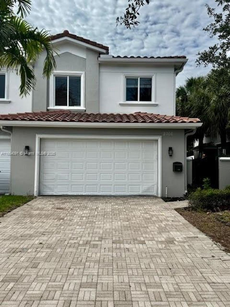 Don't miss this beautifully maintained 3-bedroom, 2.5-bath town home in the heart of Coral Ridge! This spacious property features an open-concept layout, a modern kitchen with granite countertops, stainless steel appliances, and a large living area perfect for entertaining. Step outside to your private sparkling pool and patio – ideal for outdoor living year-round. The home also offers a 2-car garage and a large driveway that fits at least three additional vehicles. Located on a quiet street, just minutes from the beach, top-rated schools, and vibrant shopping and dining. Easy to show!!