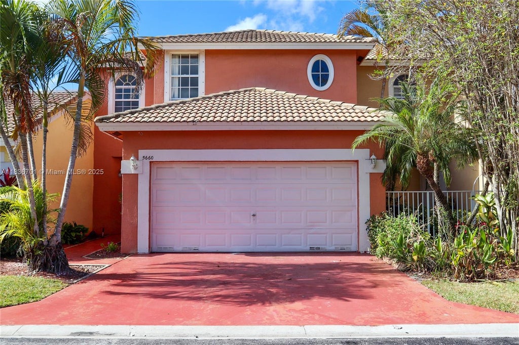 Photo of 5660 NW 120th Ter, Coral Springs, FL 33076 (MLS # A11836701)