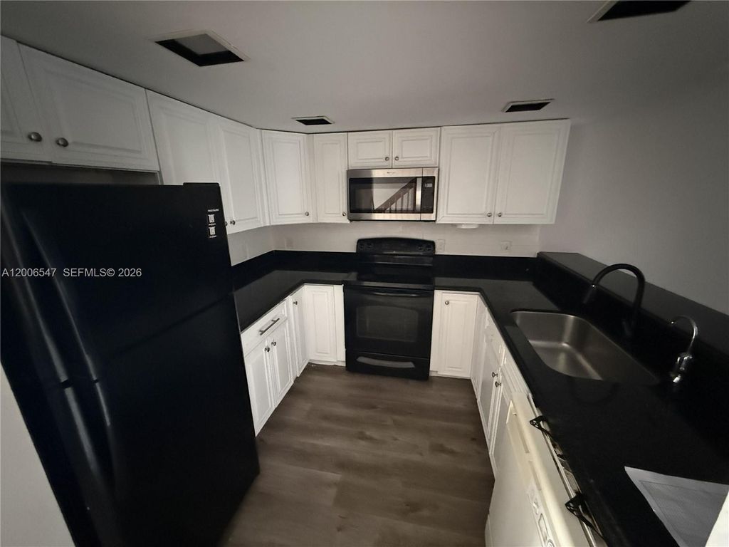 Photo of 4220 SW 71st Way, Davie, FL 33314 (MLS # A12006547)