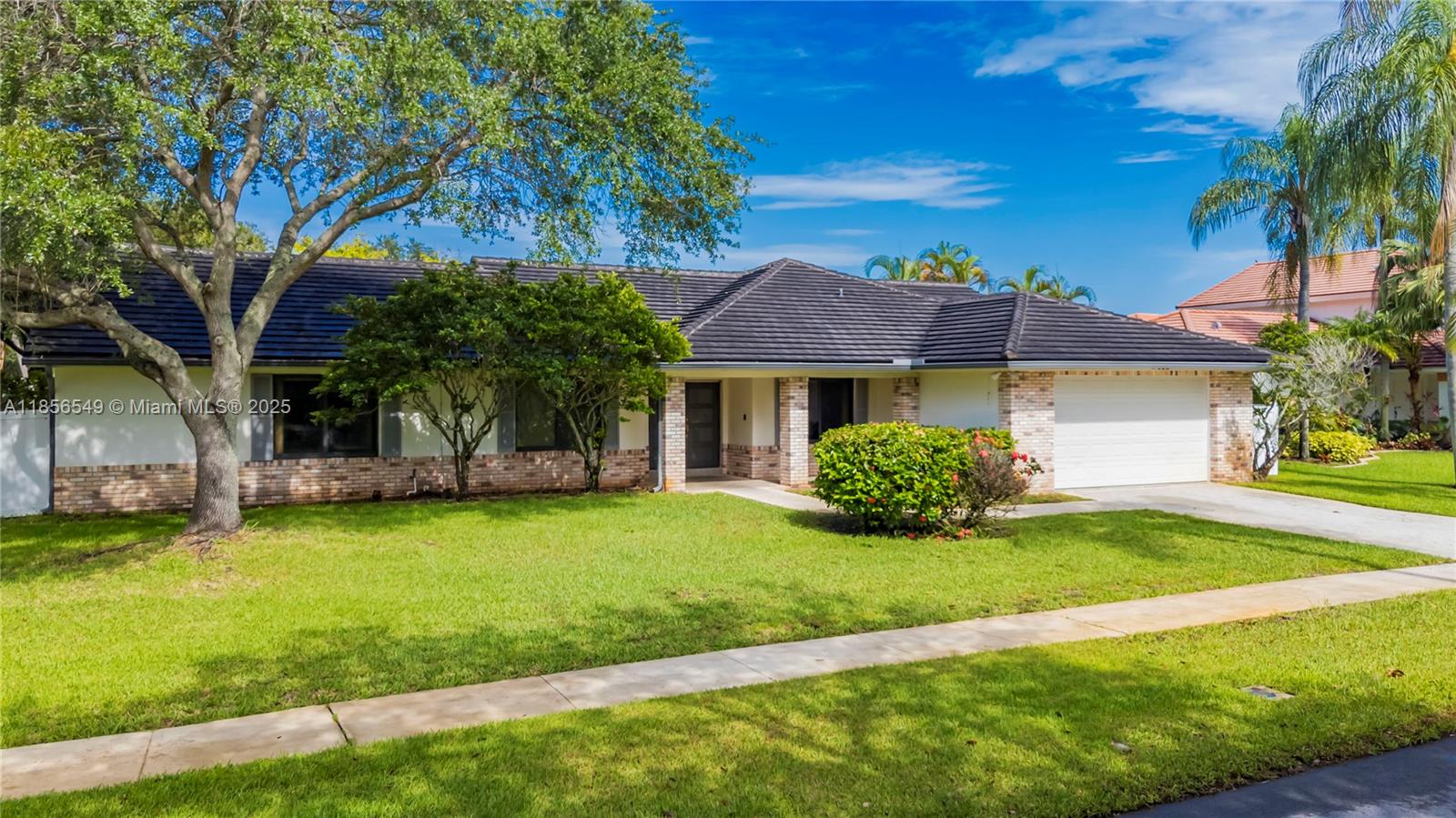 Beautifully maintained corner-lot home in Pasadena Estates I, Chapel Trail, featuring 3 bedrooms, 2.5 baths, and an oversized fenced yard on more than a quarter acre perfect for a pool and outdoor living. Recent upgrades include a flat-tile roof (2018), full impact windows and doors, an impact garage door, and a durable PVC fence installed in 2018 for privacy and low maintenance. Inside, soaring high ceilings, abundant natural light, and a thoughtful layout offer comfort, style, and exceptional storage throughout. The screened patio is ideal for entertaining or relaxing year-round. Enjoy a large laundry room, 2-car garage, and low HOA that includes cable and internet. Conveniently near US-27 for an easy commute south, close to shopping, dining, parks, and top-rated schools.