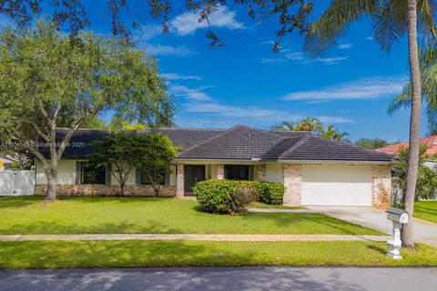 Photo of 400 NW 202nd Way, Pembroke Pines, FL 33029 (MLS # A11856549)
